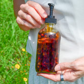 Pretty Farm Girl Lymph Love Body Oil for Massage, a health and beauty product with a smooth, nourishing oil for relaxation.