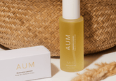 Bottle of M.S Skincare AUM Ayurvedic Oil with dropper cap, featuring natural ingredients and traditional herbal packaging.