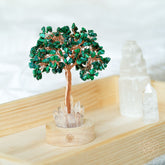 Malachite Anxiety Tree Lamp night light by Conscious Items with a green malachite stone design and tree-shaped structure.