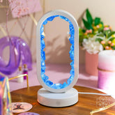 Clear quartz night light from Conscious Items called Manifest Success, designed as a lamp of achievement and positive energy.