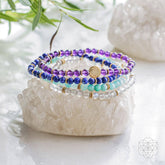Set of four manifestation magnet jewelry pieces from Conscious Items, featuring unique designs for positive energy and intention.