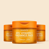 Maree Dark Spot Fading Vitamin C Pads showing a container of toner pads with bright orange and white packaging on a white background