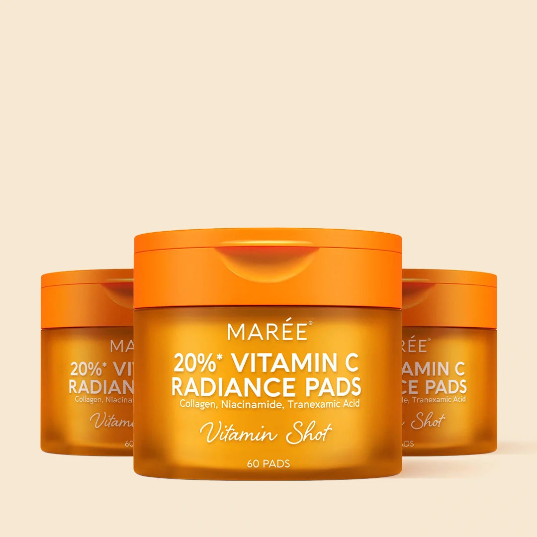 Maree Dark Spot Fading Vitamin C Pads showing a container of toner pads with bright orange and white packaging on a white background