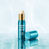 Maree Instant Eye Smoother Balm tube with applicator, designed to reduce puffiness and dark circles around the eyes.