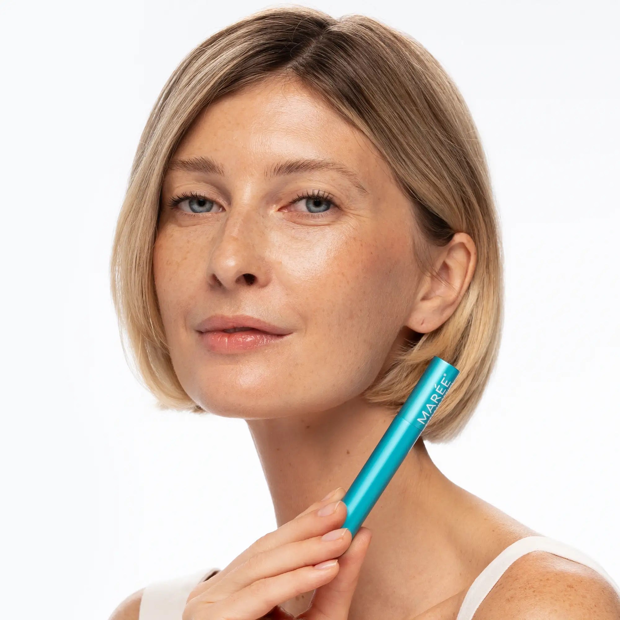 Maree Lash &amp; Brow Growth Serum bottle with applicator brush, designed to enhance eyelash and eyebrow length and fullness.
