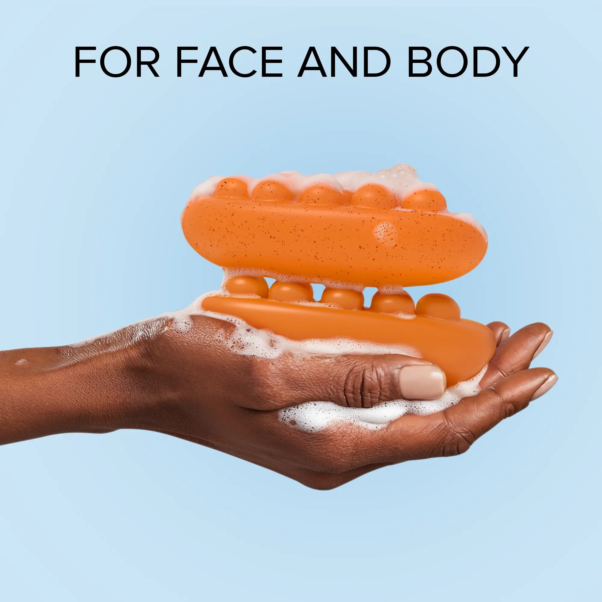 Maree Turmeric Kojic Soap and Scrub shown with soap bar and exfoliating scrub in a natural setting