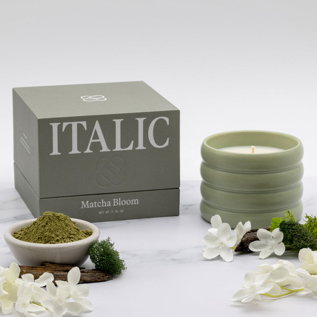 Italic soy wax ceramic candle with a matcha green design, featuring a lid and a wick for a cozy, natural ambiance.