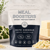 White Cheddar Collagen+ Protein Blend powder by Meal Boosters, showing the protein powder container with label and scoop.