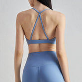 Blackout Barbell Aria Bra shown on a mannequin, featuring a sleek design with adjustable straps and supportive fabric for everyday wear.