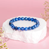 Rare kyanite bracelet from Conscious Items titled "My Truth, My Power" featuring deep blue gemstone beads and silver accents.