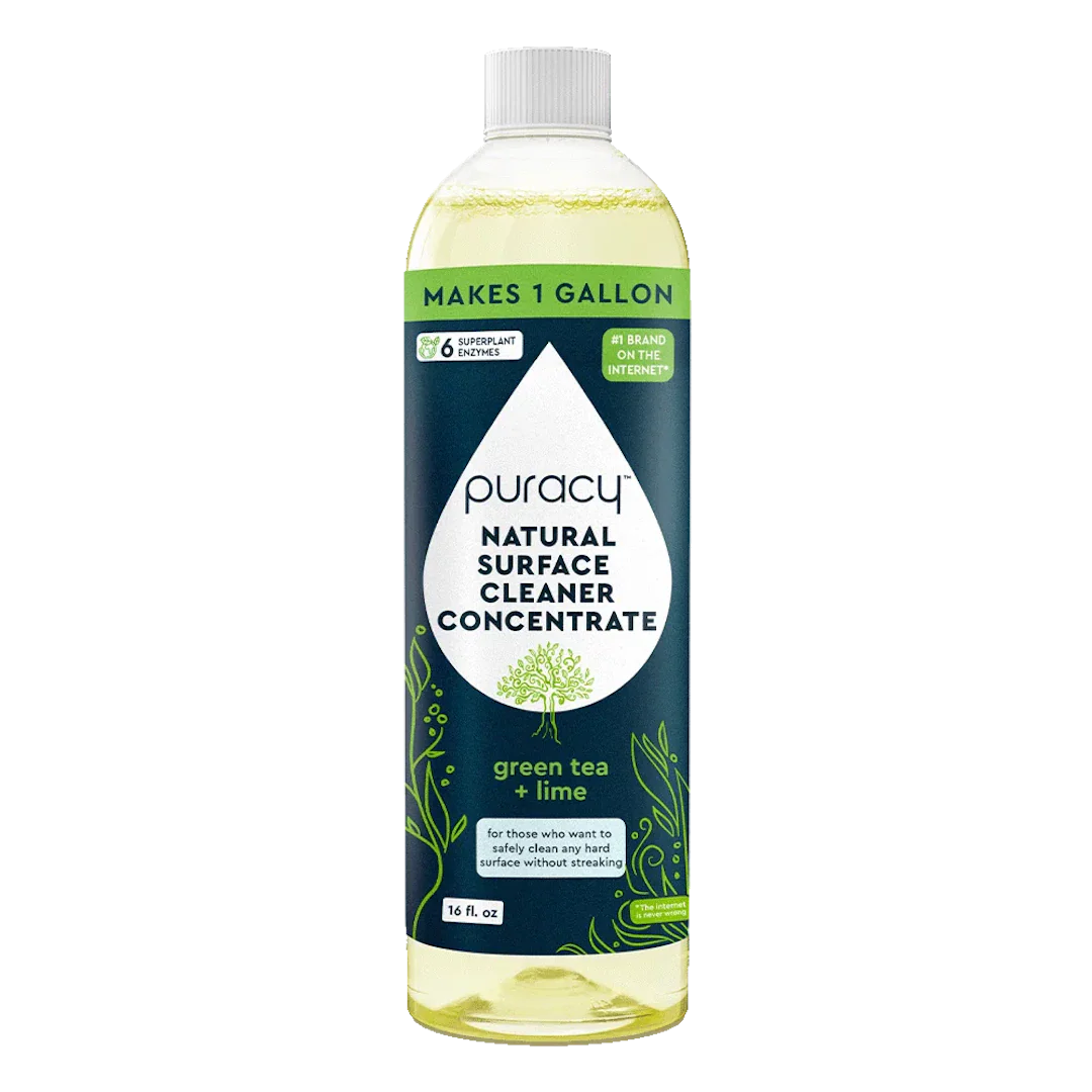Puracy Everyday Multi-Surface Cleaner concentrate bottle with spray nozzle for versatile cleaning of countertops, appliances, and more.