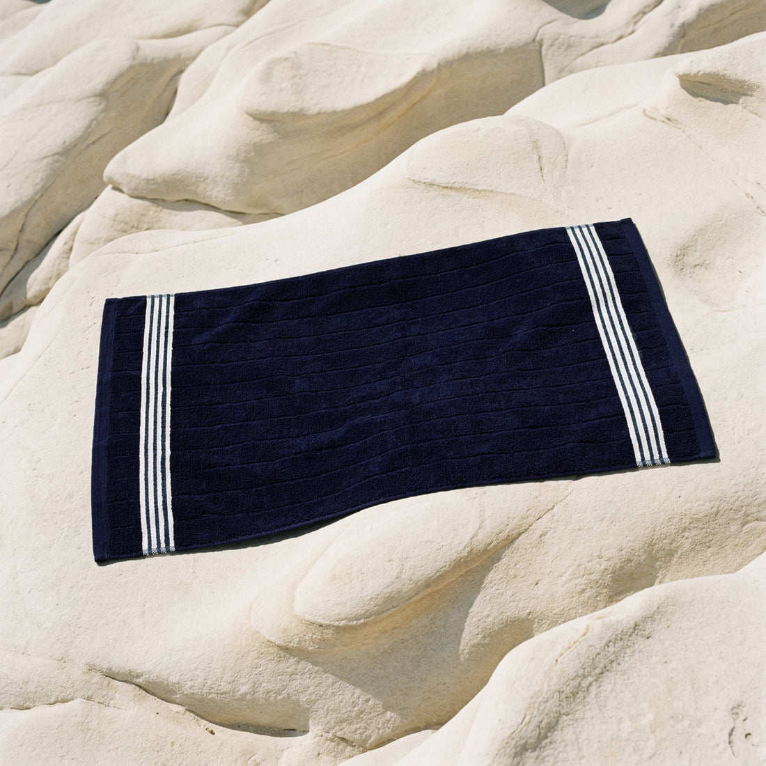 Nautilus Australian Cotton Bath Towel from Italic, soft and plush home towel with a white and neutral woven design.