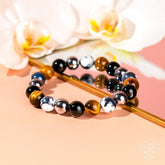 Conscious Items Orca’s Armor Triple Protection & Healing Bracelet featuring black beads and silver accents for wrist wear.