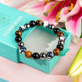 Conscious Items Orca’s Armor bracelet featuring triple protection and healing design in black and silver, stylish and durable jewelry.