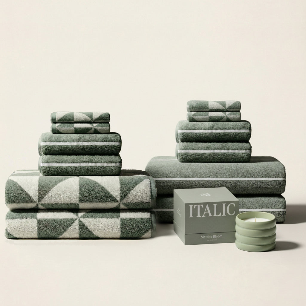 Set of Deia Australian Cotton Towels by Italic, soft and plush for home bed or bathroom use, shown in a neutral palette.