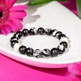 Zebra Jasper bracelet by Conscious Items featuring polished zebra-striped stone beads on an elastic band.