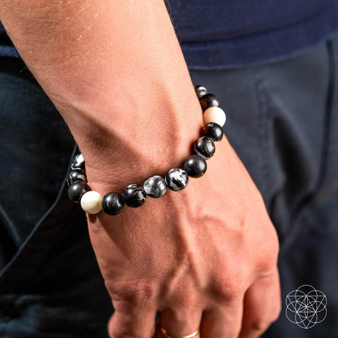 Zebra Jasper bracelet from Conscious Items featuring black and white striped beads, designed for stylish wristwear and spiritual balance