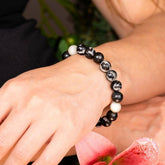 Zebra Jasper bracelet from Conscious Items with alternating black and white stone beads, designed for stylish wristwear.