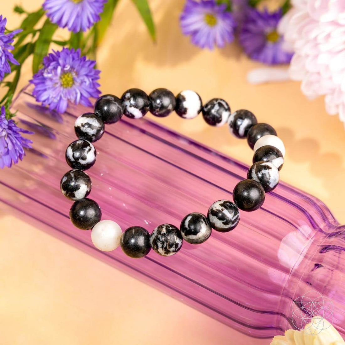 Zebra Jasper bracelet by Conscious Items featuring black and white patterned beads, designed for stylish natural stone jewelry.
