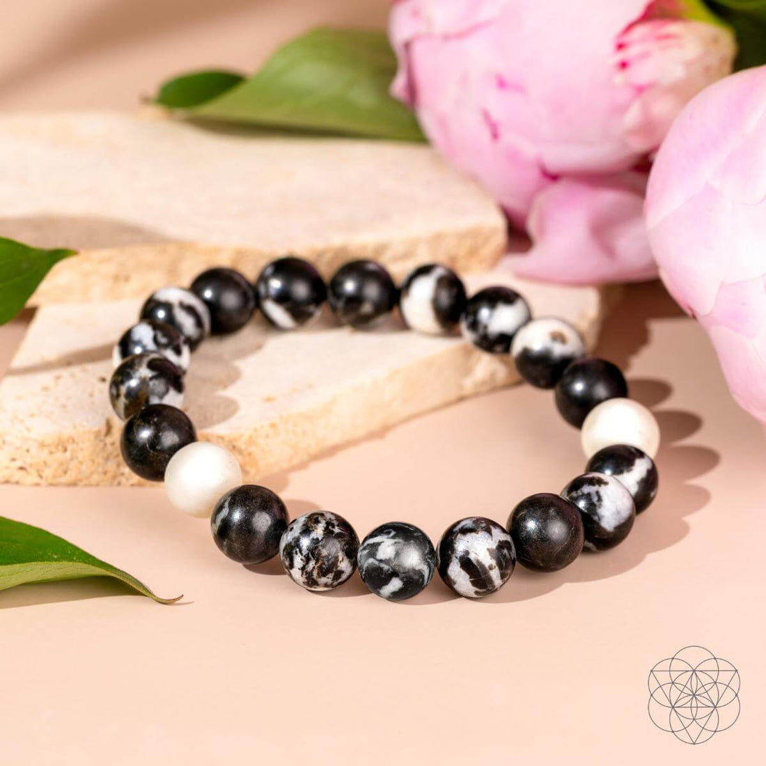 Zebra Jasper bracelet titled Permission to Pause from Conscious Items, featuring polished stone beads in black and white zebra pattern.