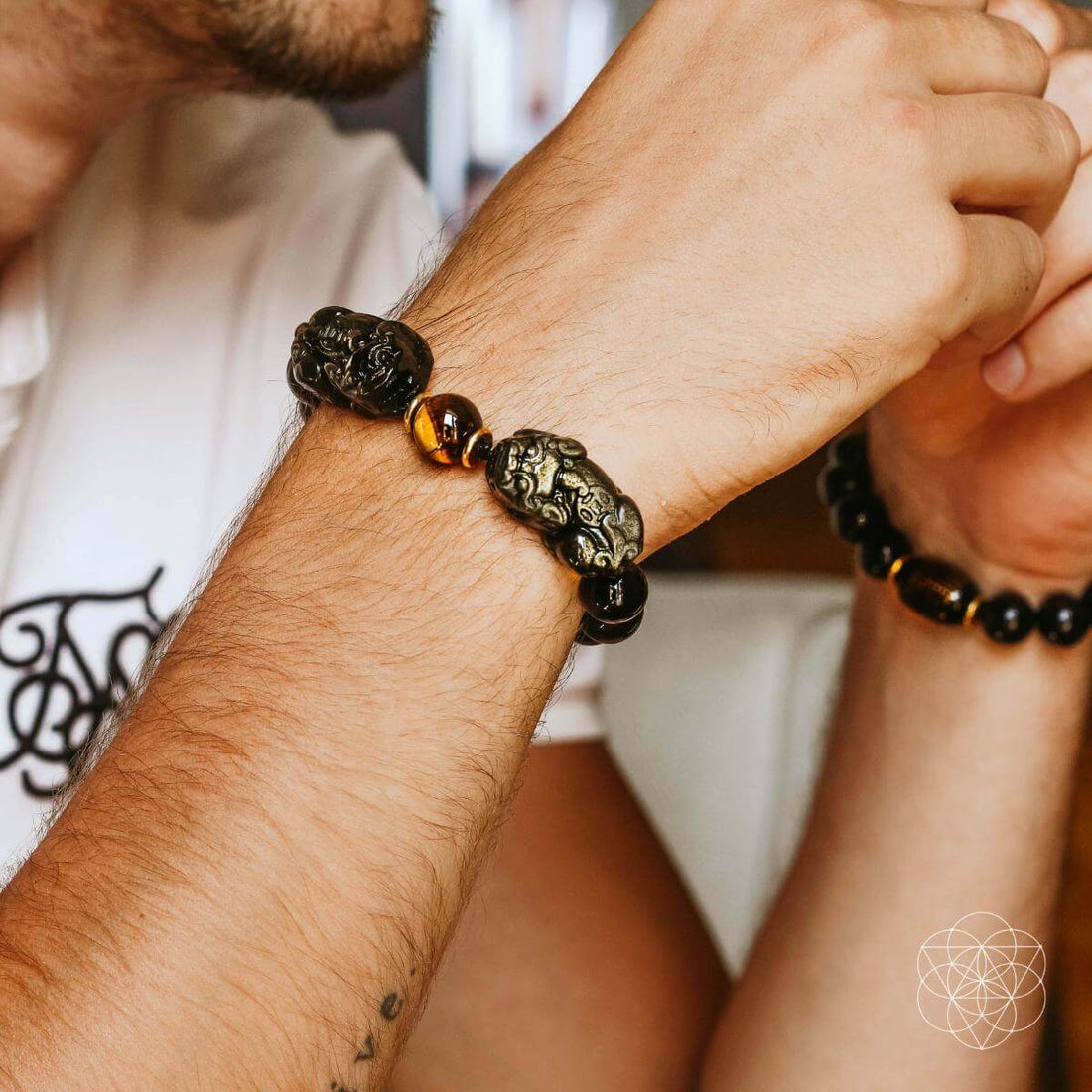 Conscious Items Pi Yao Wealth Bracelet featuring a traditional metal Pi Yao charm on a beaded bracelet for good fortune.