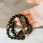 Conscious Items Pi Yao Wealth Bracelet featuring traditional Chinese charm and beaded design for good fortune and prosperity.