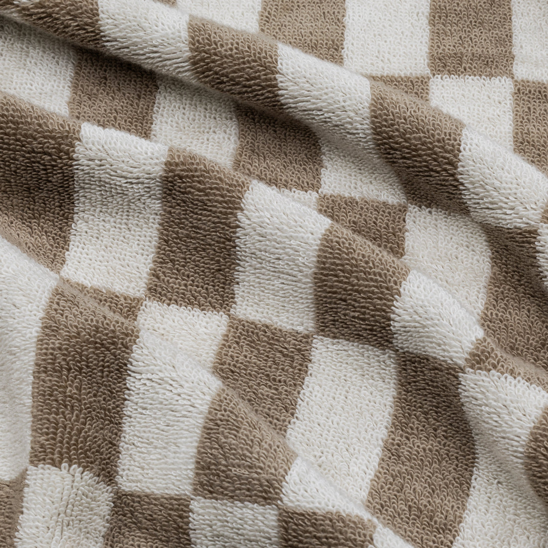Swatch of Pietra Australian Cotton Towels by Italic showing soft, plush fabric in neutral tones