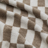 Swatch of Pietra Australian Cotton Towels by Italic showing soft, plush fabric in neutral tones.