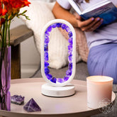 Amethyst night light from Conscious Items called Portal to Peace, designed for stress relief with a calming purple glow.