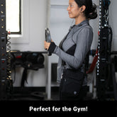 Shield Your Body SYB Phone Pouch Deluxe, a sleek mobile phone accessory with secure closure, shown in a gym environment.