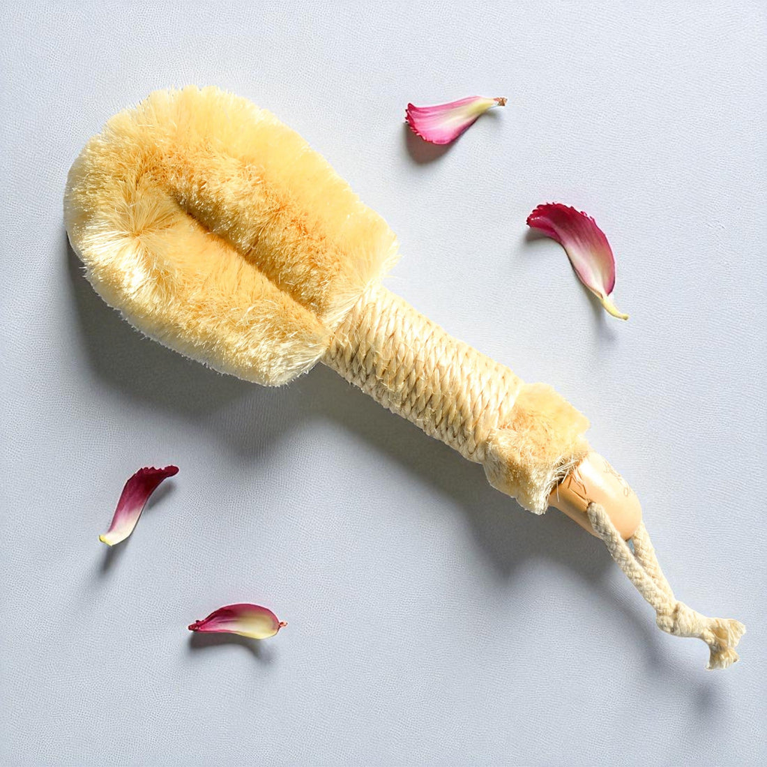 Pretty Farm Girl sisal exfoliating dry brush for skincare, featuring natural bristles and ergonomic handle for gentle exfoliation.