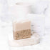 Handmade coffee and cream tallow and goat milk soap bar by Pretty Farm Girl, displayed in a box.