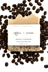 Handmade coffee and cream tallow and goat milk soap bar by Pretty Farm Girl, featuring a creamy, textured soap with coffee accents.