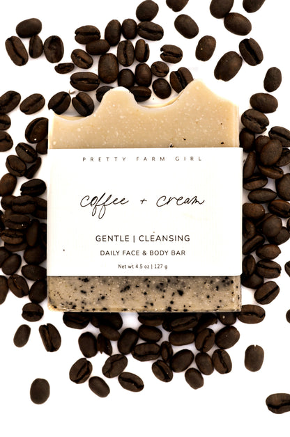 Handmade coffee and cream tallow and goat milk soap bar by Pretty Farm Girl, featuring a creamy, textured soap with coffee accents.