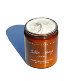 Fragrance-free tallow and honey cream for sensitive skin by Pretty Farm Girl, showing a jar of nourishing skincare cream.