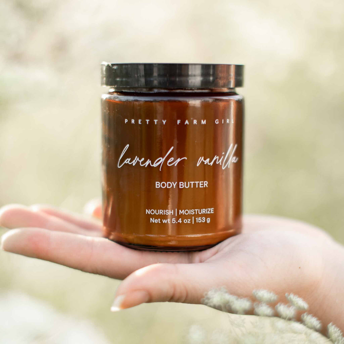 Lavender vanilla bean tallow body butter cream in a jar by Pretty Farm Girl, showcasing a smooth, creamy texture with lavender and vanilla scent.