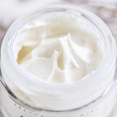 Pretty Farm Girl Fresh Face Cream, anti-aging tallow moisturizer for smooth, hydrated skin, shown in a white jar.