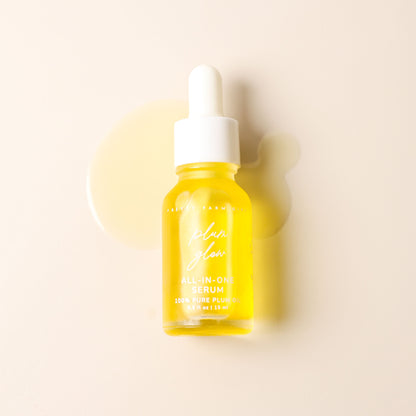 Pretty Farm Girl Plum Glow Multipurpose Face Serum with 100% pure plum oil, featuring a clear glass bottle and dropper applicator.