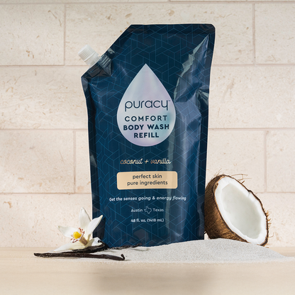 Puracy acidified, pH balanced body wash refill bottle with a clean, minimalist design and label showing product details.