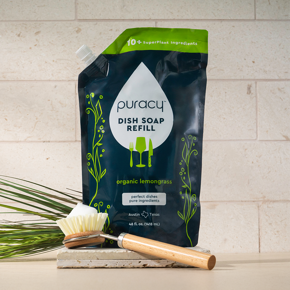 Puracy dish soap refill bottle with natural ingredients, designed for effective cleaning of dishes and kitchenware.