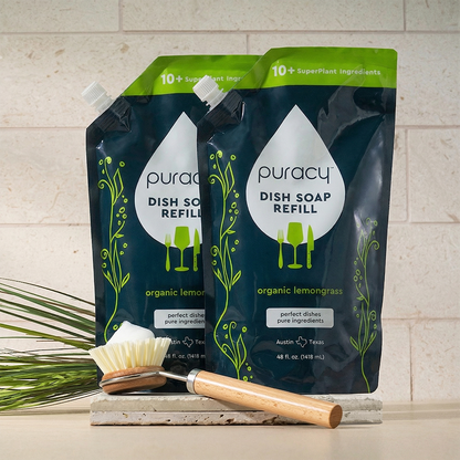 Puracy dish soap refill pack with two bottles, biodegradable and gentle for cleaning dishes and kitchenware.