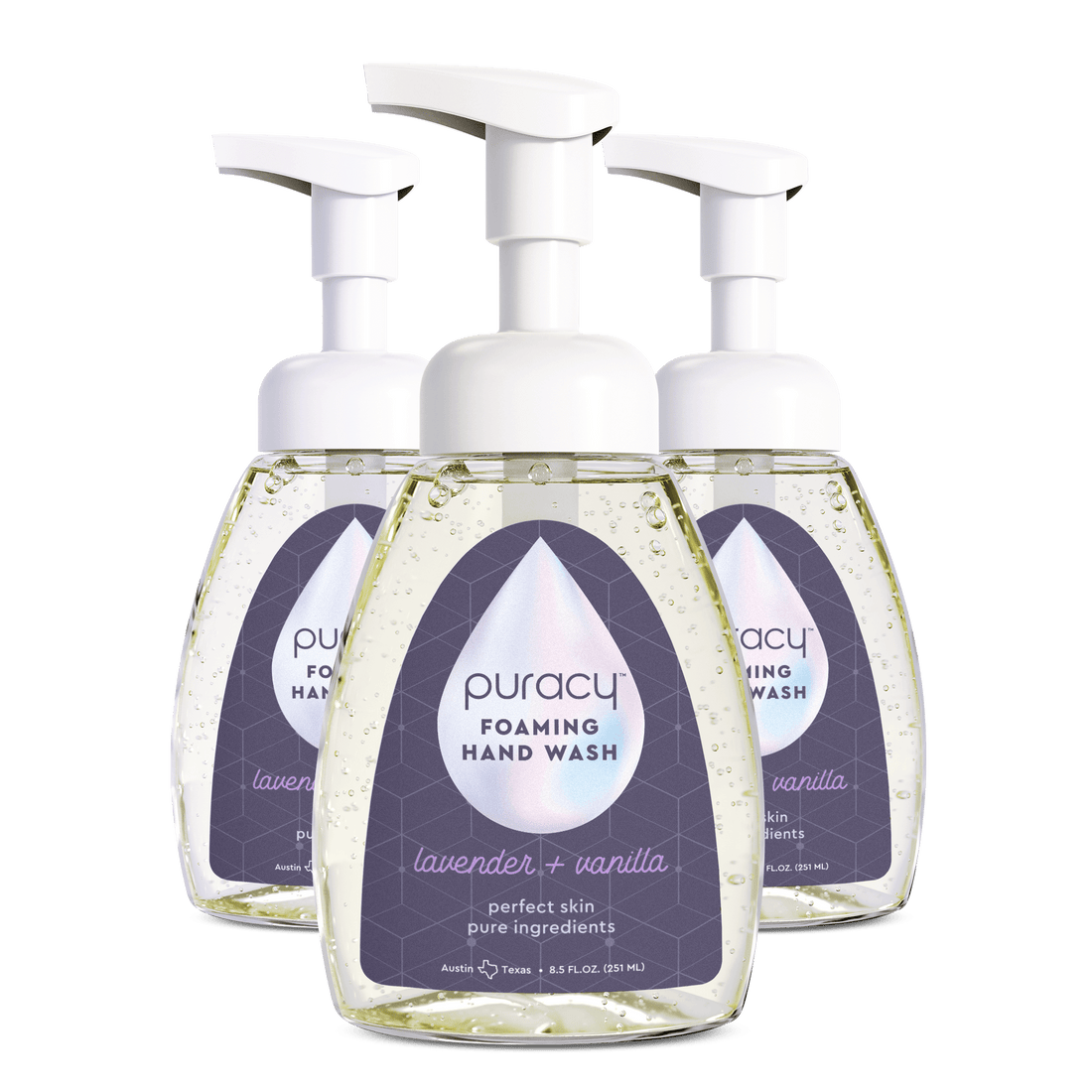 Puracy foaming hand soap in a clear pump bottle, showing rich foam texture and fresh citrus scent on the label.