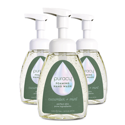Puracy foaming hand soap in a clear pump bottle with white liquid soap visible, designed for gentle hand cleansing.