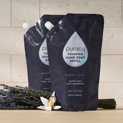 Puracy foaming hand soap refill pack with two bottles, gentle and moisturizing hand soap in a clear dispenser.