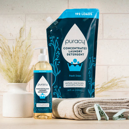Puracy concentrated laundry detergent in a 48oz bottle, sulfate-free formula with fresh linen scent, suitable for all laundry types.