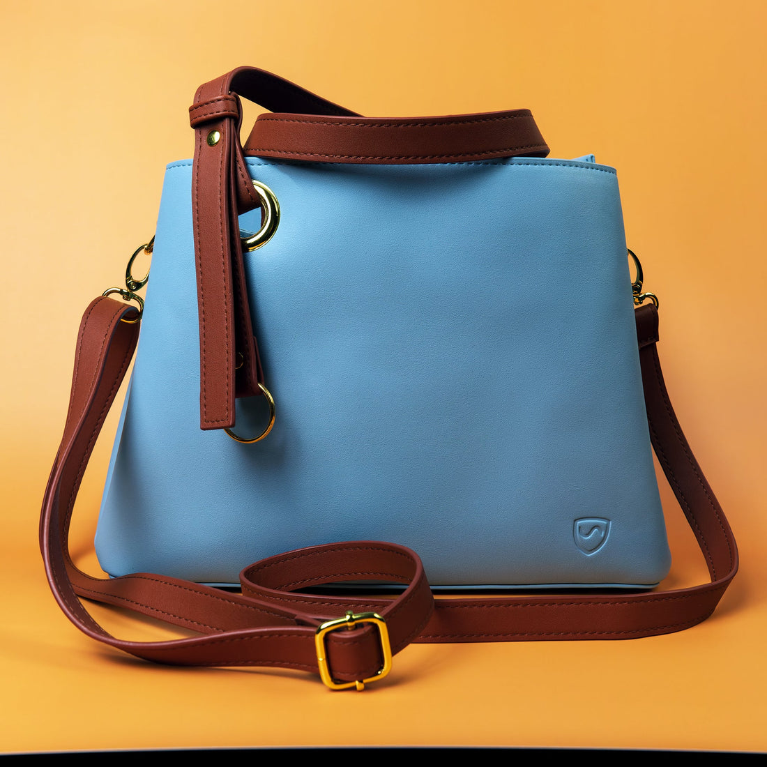 Orange Shield Your Body SYB purse designed for mobile phone accessories, with a sleek, compact design and secure closure.