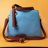 Orange Shield Your Body SYB purse designed for mobile phone accessories, with a sleek, compact design and secure closure.