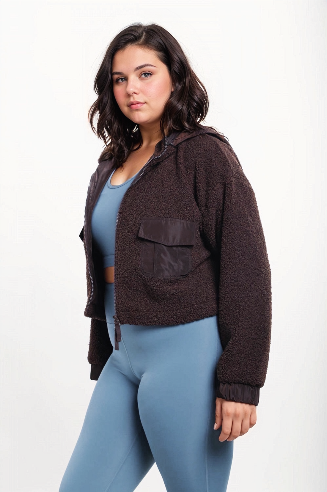 Fitkitty Culture Curvy Sherpa Dreams cropped hooded jacket in cozy sherpa fabric, shown on a model with a relaxed fit.