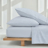 Luxury Australian sateen sheet set by Italic, featuring smooth, silky bed sheets in a cozy home bedroom setting.