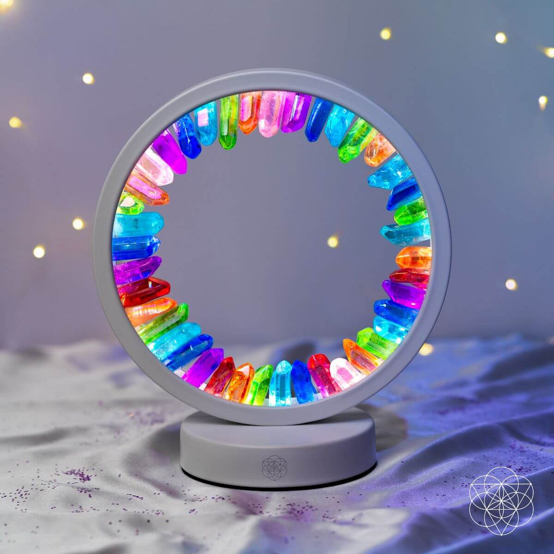 Rainbow After the Storm Clear Quartz Night Light by Conscious Items featuring a rainbow design and a clear quartz base.